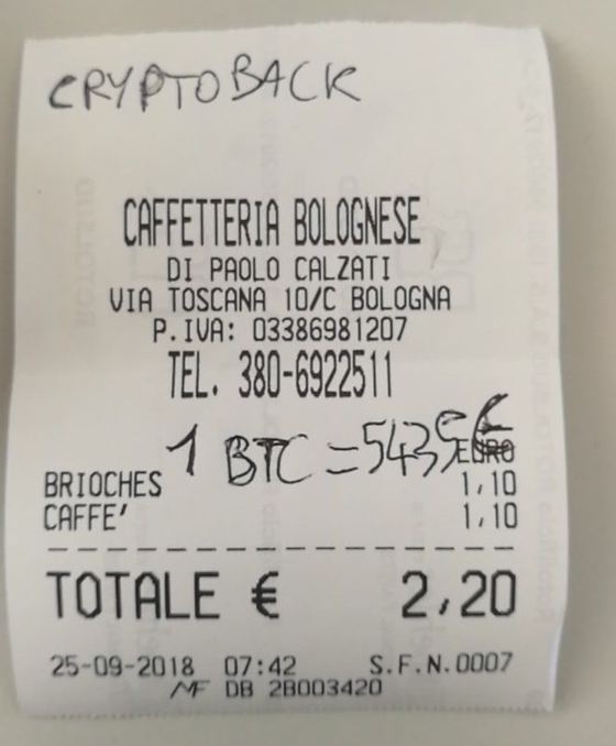 A café receipt from Bologna, Italy, September 2018: coffee and a brioche, marked CryptoBack and 1 BTC = €5,435