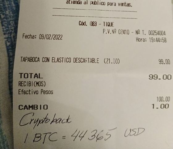 A pharmacy receipt from Buenos Aires, February 2022, marked Cryptoback and 1 BTC = $44,365