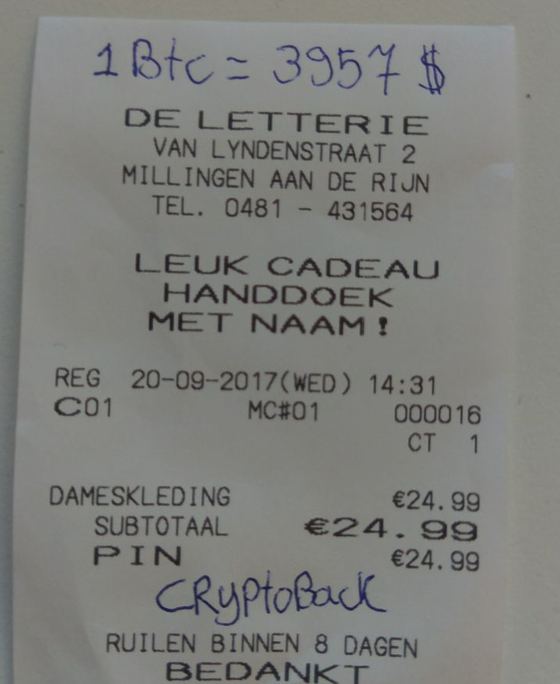 A shop receipt from Millingen, Netherlands, September 2017, marked CryptoBack and 1 BTC = $3,957
